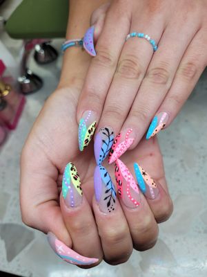 Colorful hard-gel nail set by Jessika at Your Nail Salon